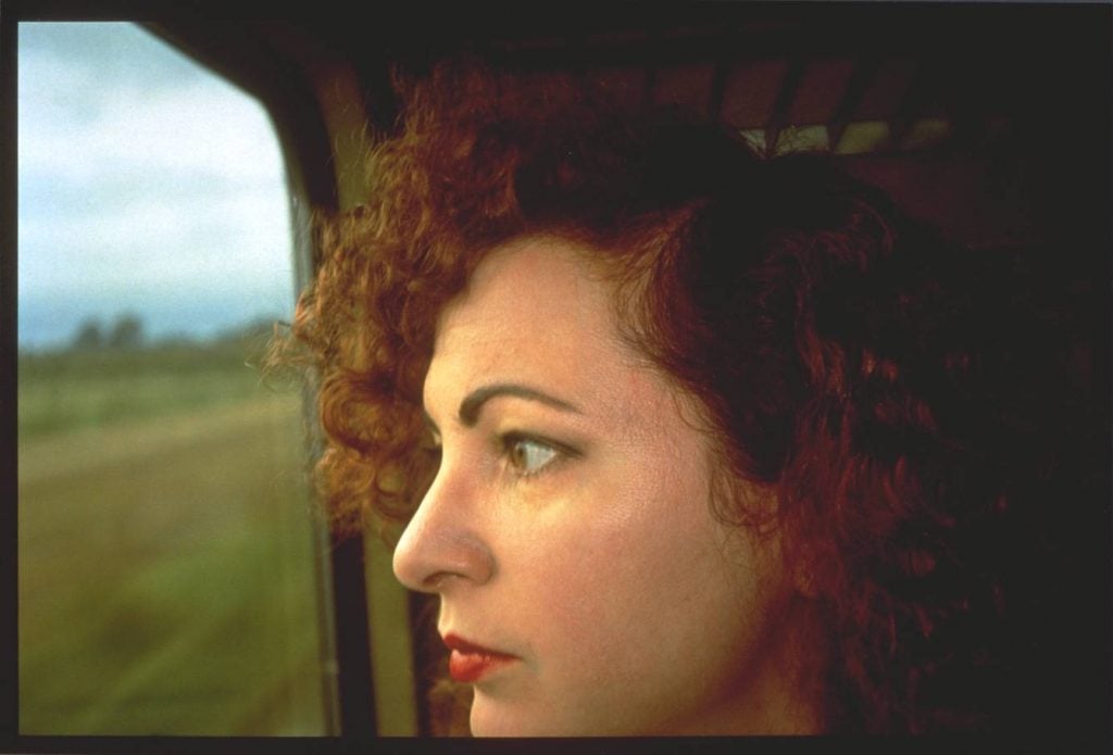 Nan Goldin, <i>Self-Portrait on the train, Germany </i>(1992). © Nan Goldin. Courtesy of the Whitney Museum of American Art.