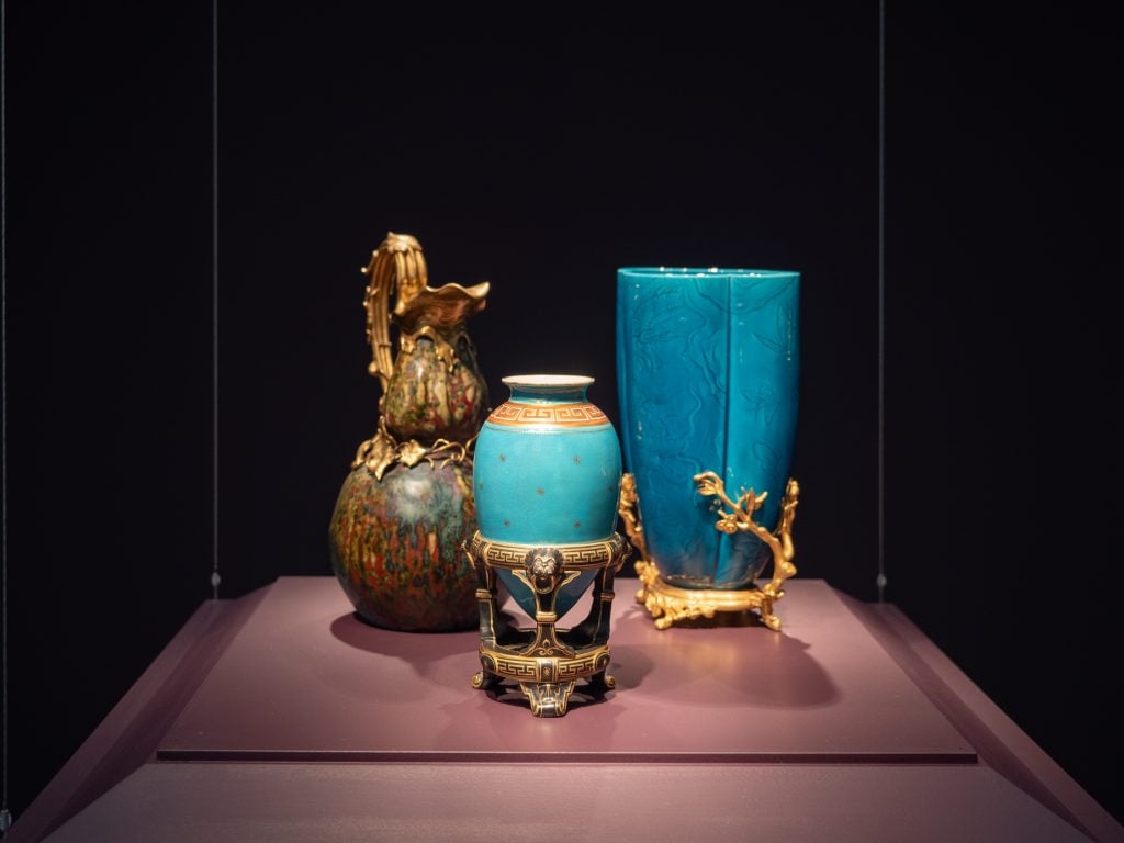 photograph of turqouise and gold antique vases and pitcher