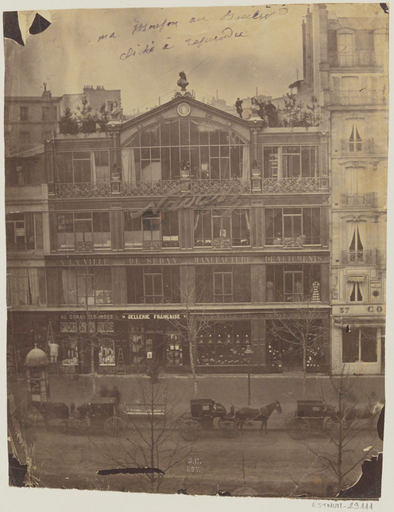 a black and white photograph of the exterior of the building that held the first exhibition featuring impressionist paintings