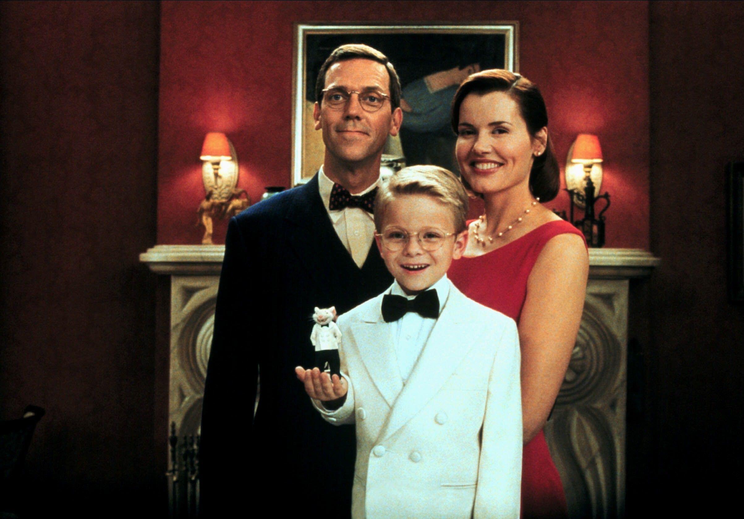 Hugh Laurie, Jonathan Lipnicki, and Geena Davis in Stuart Little (1999). Photo: Maximum Film / Alamy Stock Photo.