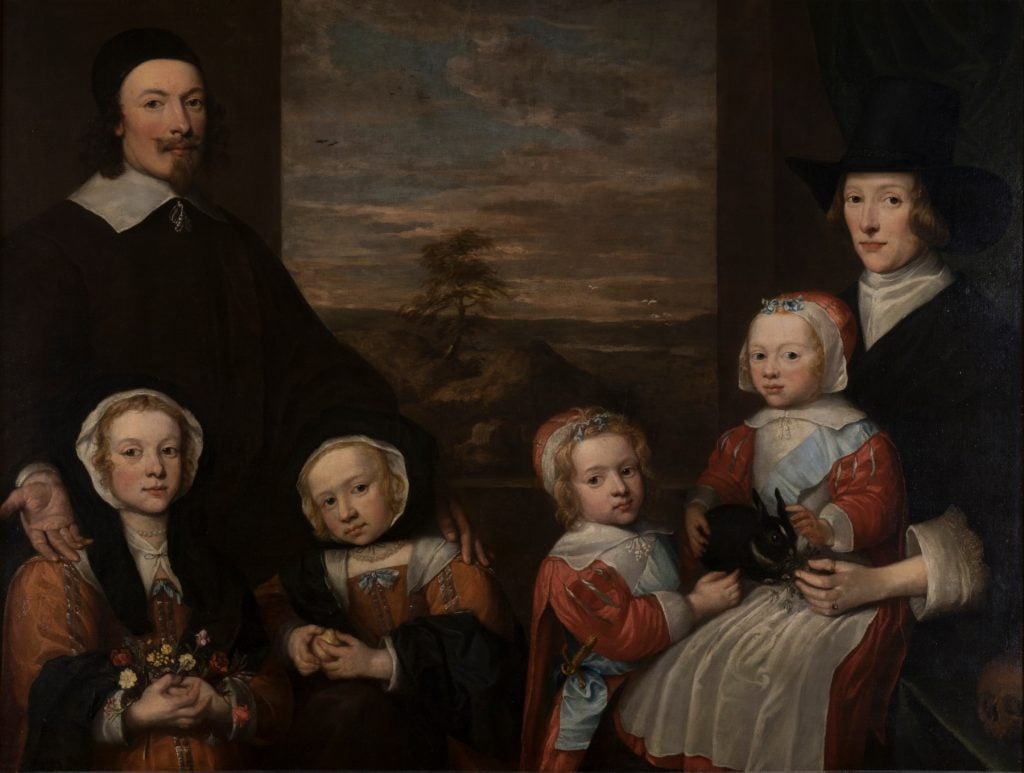 A painting with a group including two parents and four young children.