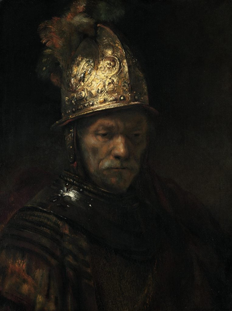  "The Man with the Golden Helmet" is a painting often attributed to the "Circle of Rembrandt van Rijn," indicating that it was created by an artist or artists closely associated with Rembrandt but not necessarily by Rembrandt himself. The painting depicts a half-length portrait of a man wearing a golden helmet, hence the title. The man's gaze is directed towards the viewer, and his expression is thoughtful and contemplative. The helmet, with its golden hue, catches the light, adding a sense of richness and opulence to the scene. The background is dark, allowing the figure to stand out prominently. 