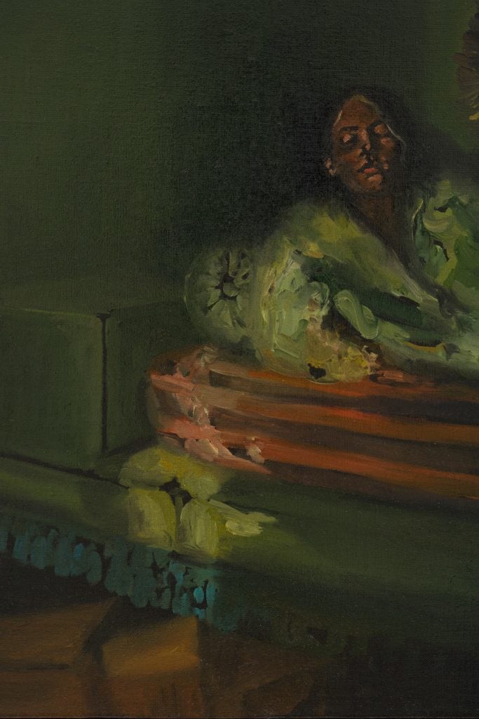 Oil painting of a woman reclining on a couch 