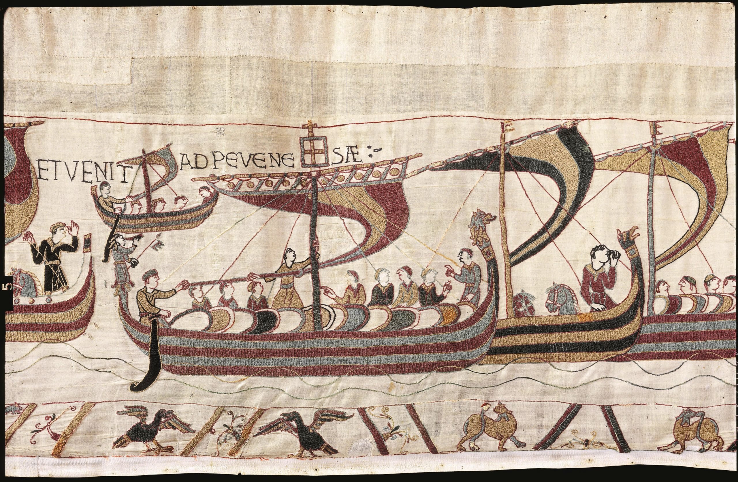 The Bayeux Tapestry depicting men sailing on warships