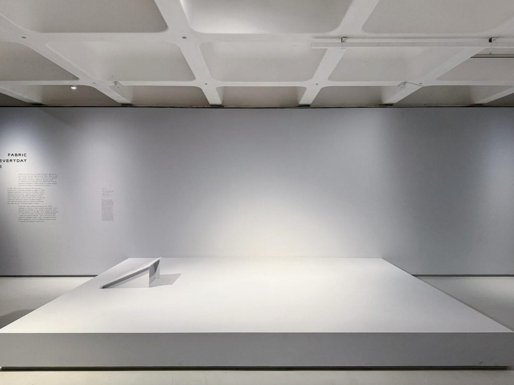 an empty raised platform in an art gallery