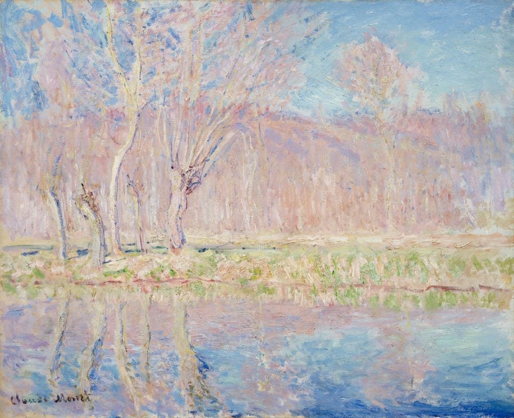 a Monet landscape showing trees in pink with purple shades