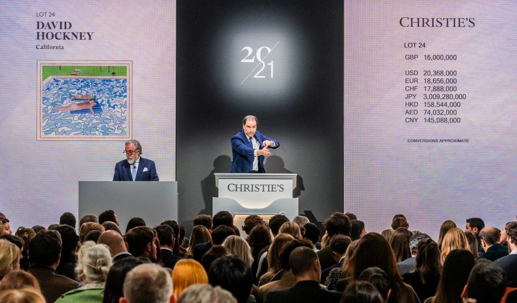 Auctioneer Adrien Meyer sells David Hockney's California at Christie's 20th/21st Century sale in London. Photo: Courtesy of Christie's.