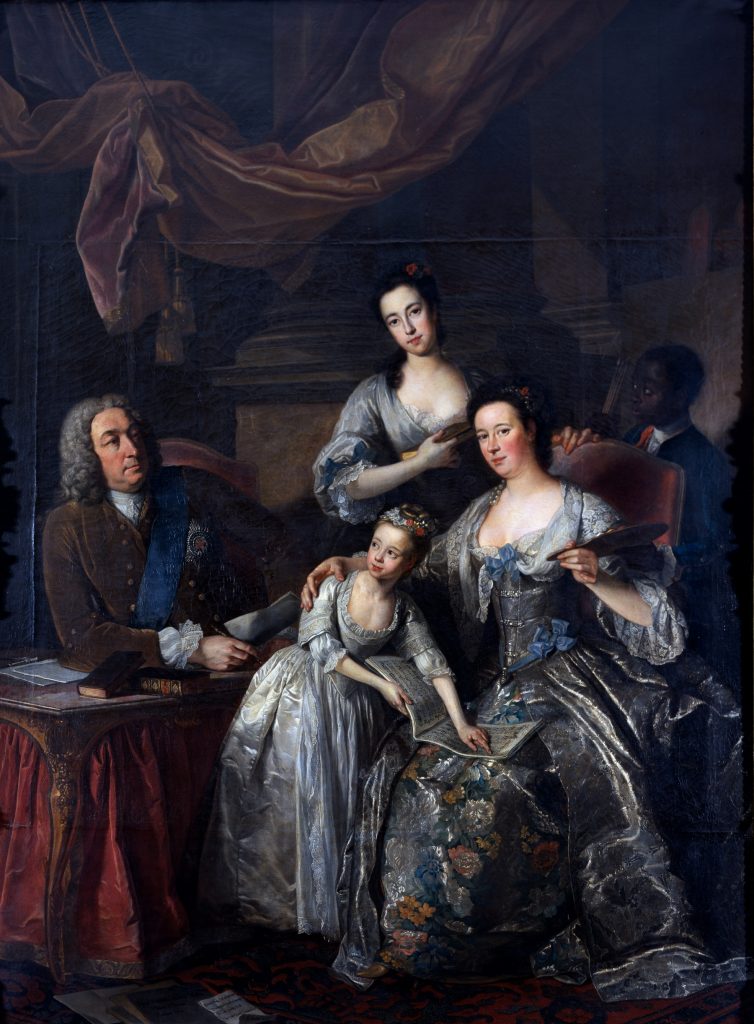a formal family portrait from the 18th century with three children, an elder daughter, a young daughter and a Black boy standing behind the group. 