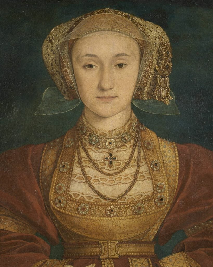 A murky, 16th-century portrait of a woman in a fine, red robe, wearing gold rings and necklaces.