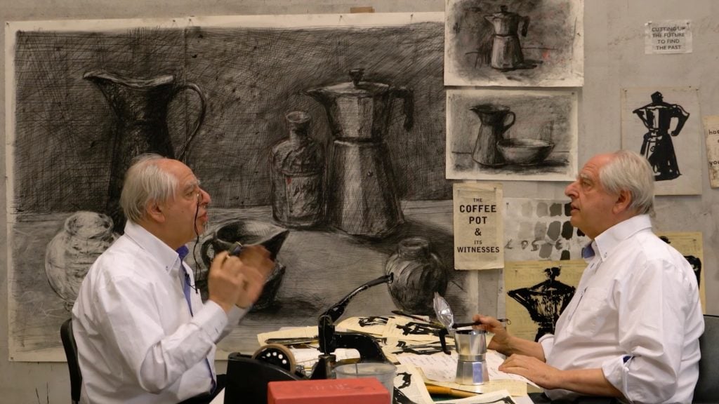 a man appears to talk to another man who is also himself with several drawings of a coffee pot in the background