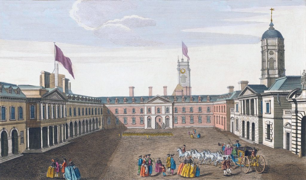 A colorized landscape of Dublin Castle, featuring a group of people in the foreground and a stately building in the background.