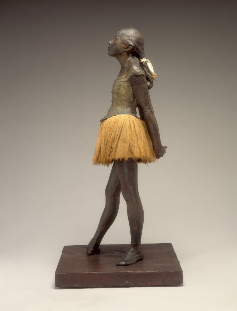 Edgar Degas's sculpture "Little Dancer Age Fourteen," where a girl in a tutu stares defiantly at the viewer