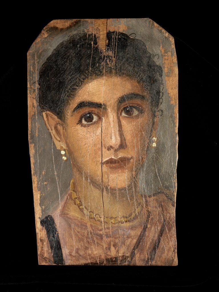 An ancient Egyptian portrait of a woman.