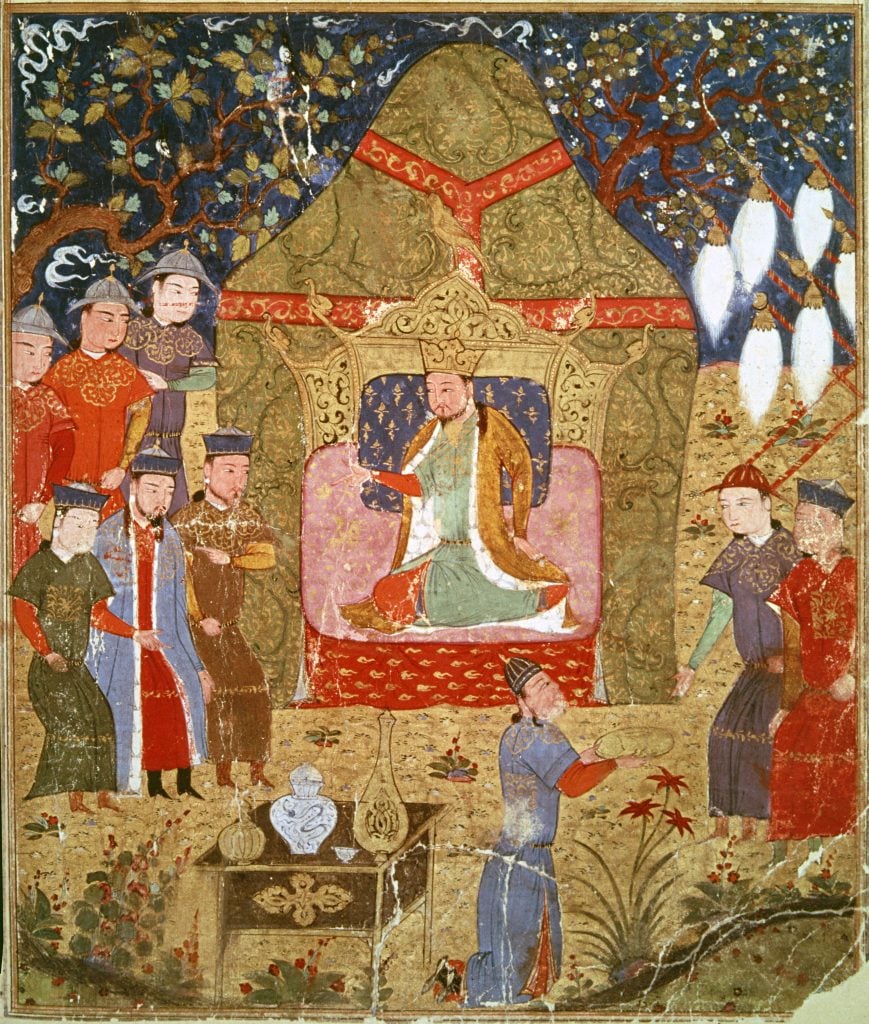 A gold-hued painting depicting a man wearing a crown surrounded by nine bowing courtiers.