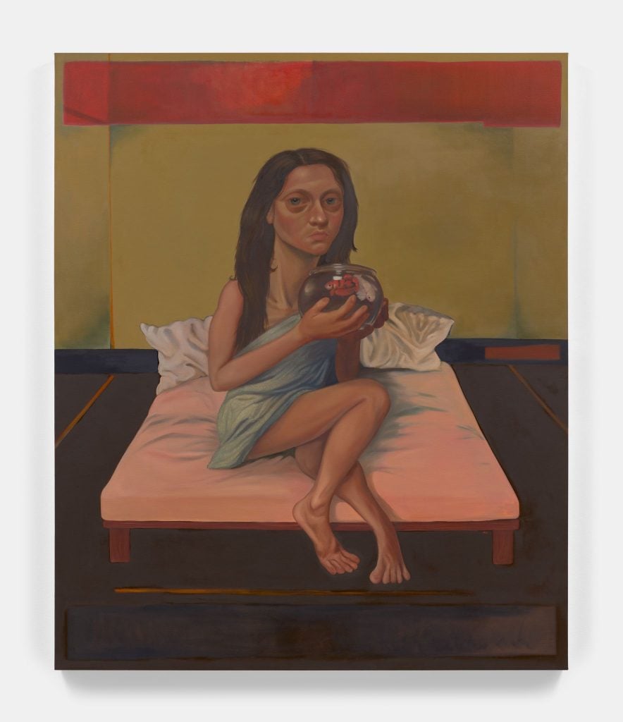 Painting by Jess Valice titled Mara featuring a woman on a bed holding a fish bowl containing two beta fish. Highly stylized with the woman's eyes large and melancholic, but otherwise expressionless. The ceiling iss red, walls a dirty yellow, and floor a dark brown black, and the bed has faded salmon pink bed linens.