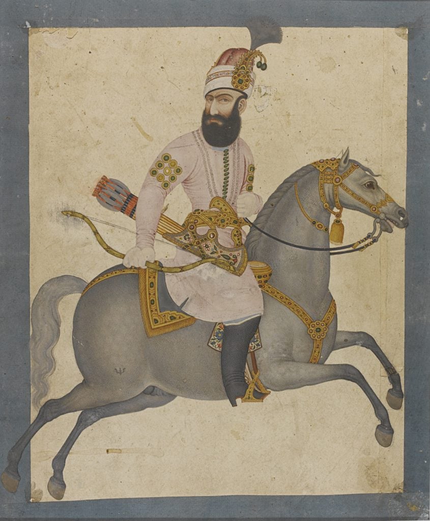 A portrait of a man on horseback.