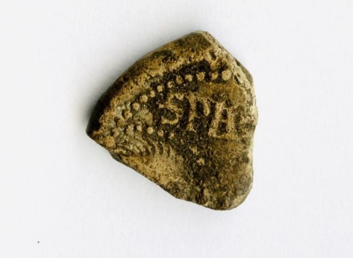 A fragment of a papal seal