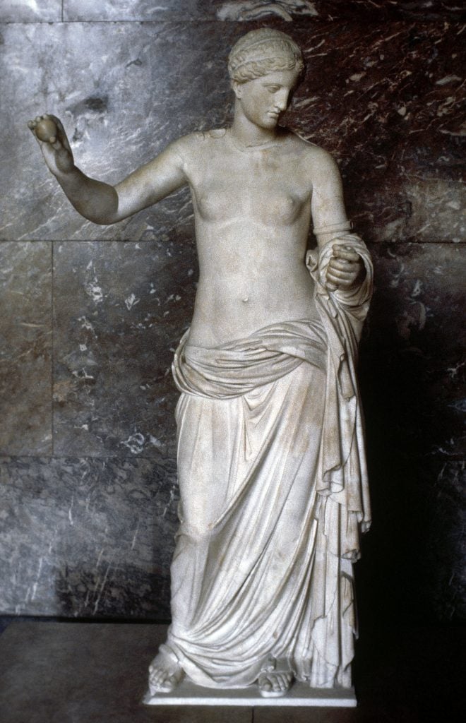 A marble statue of Venus of Arles at the Louvre Museum in Paris, France