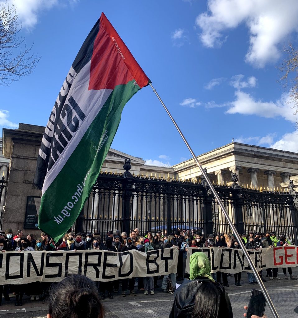 This image shows a protest outside the British Museum in London in support of Palestine and against the museum's sponsorship deal with BP.