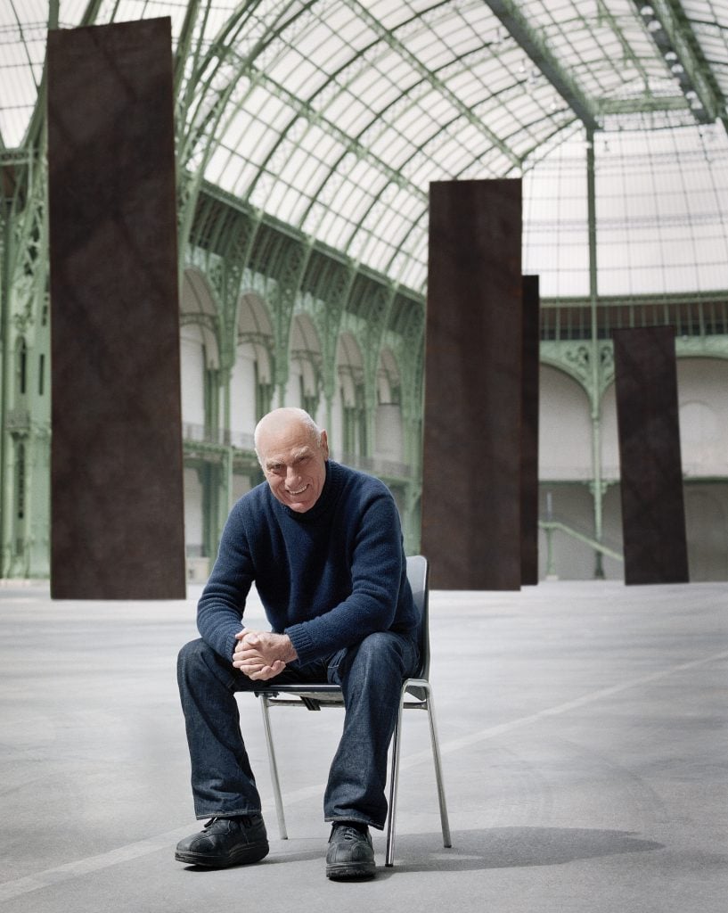 The artist Richard Serra with one of his sculptures at the Grand Palais in Paris.