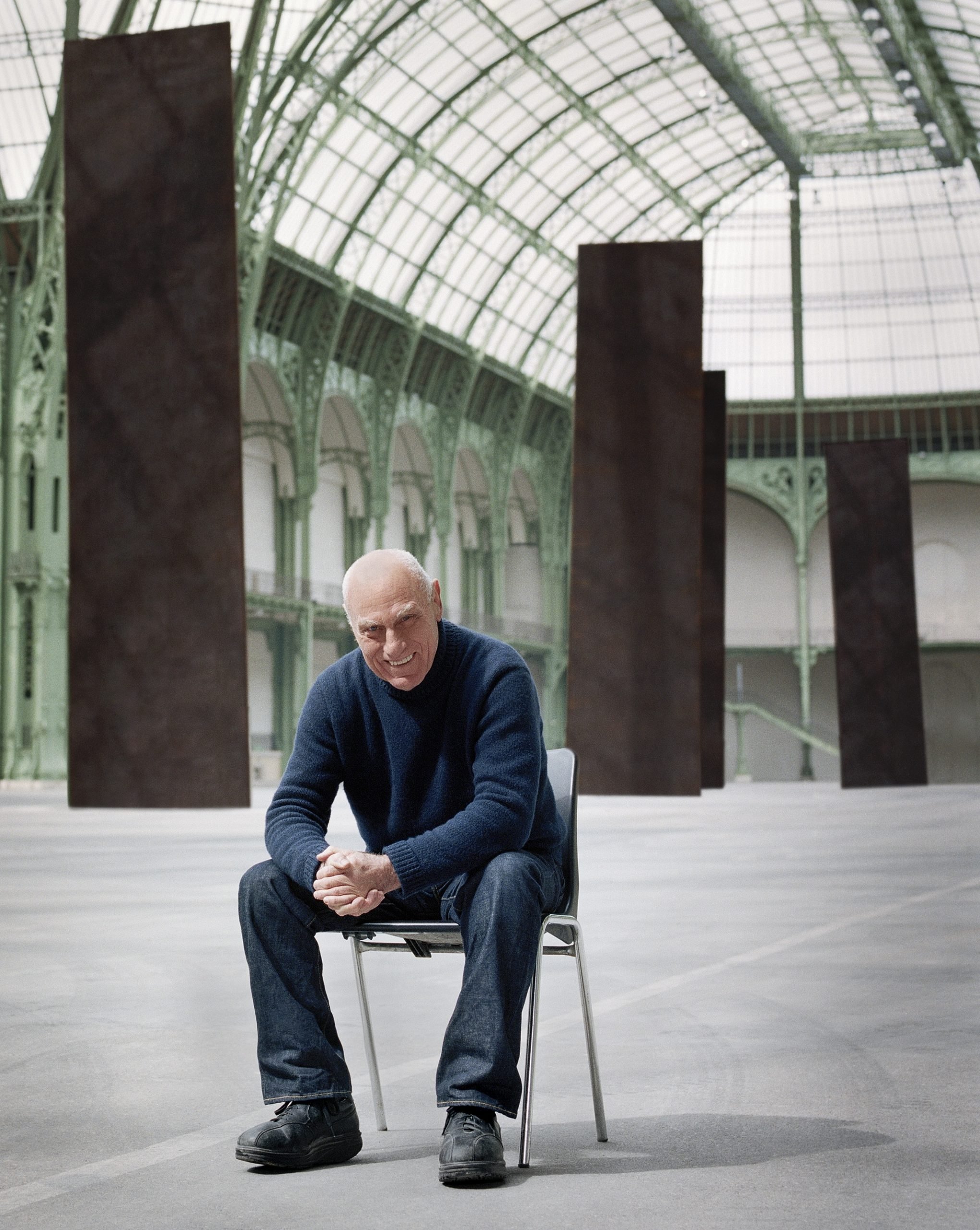 The artist Richard Serra with one of his sculptures at the Grand Palais in Paris.