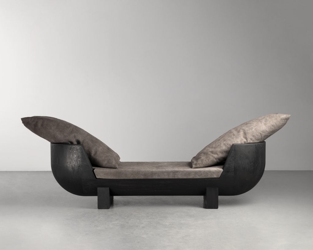 furniture scultpure by rick owens using black plywood and orso leather upholstery