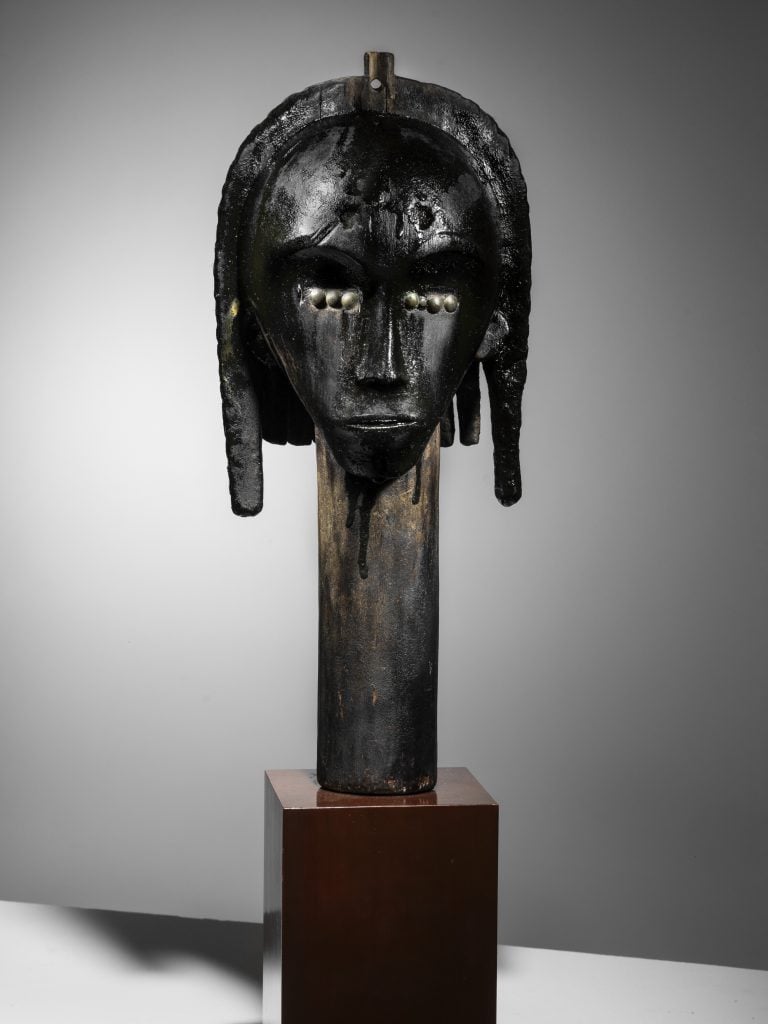 A tribal sculpture on a plinth from the Fang in Gabon.