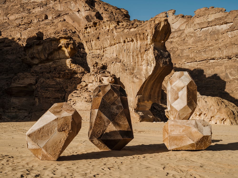 sculpture in the desert by zeinab alhasheim using aluminium, camel hides, screw bolts 