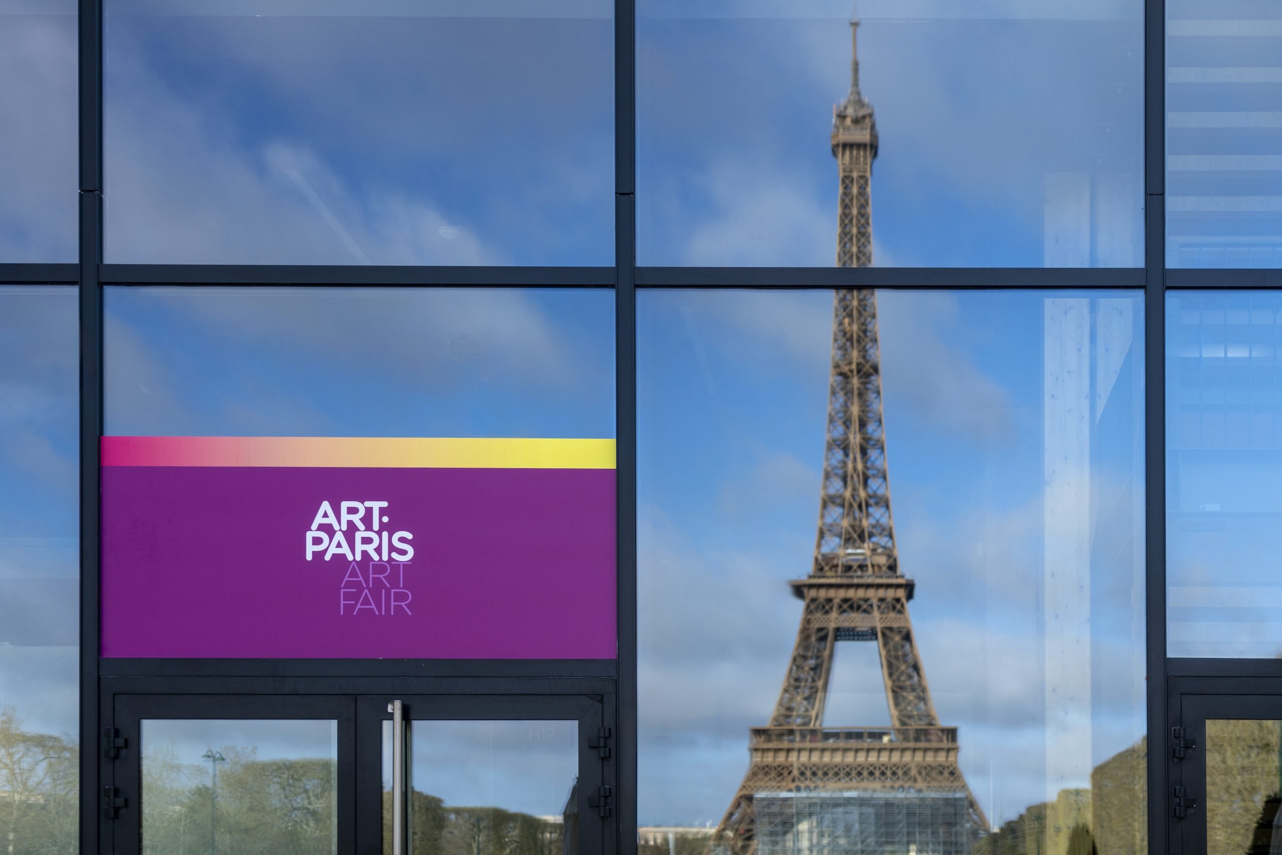 Tour Eiffel against a blue sky seen from the venue of Art Paris