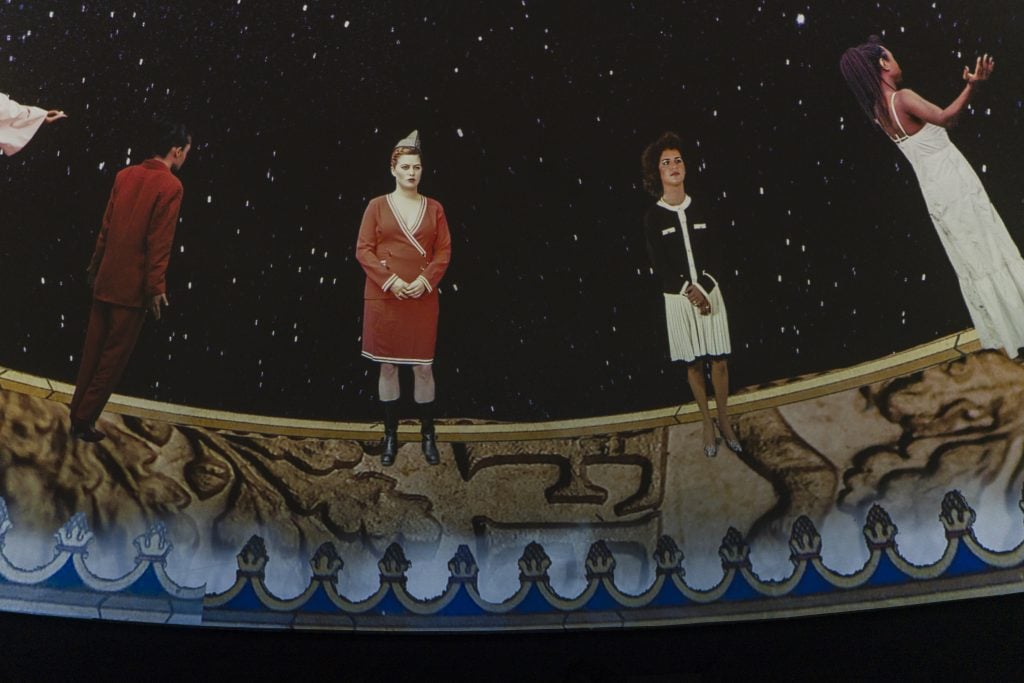 stereotypical and traditional modern Swiss women are in a circular planetarium style art projection 
