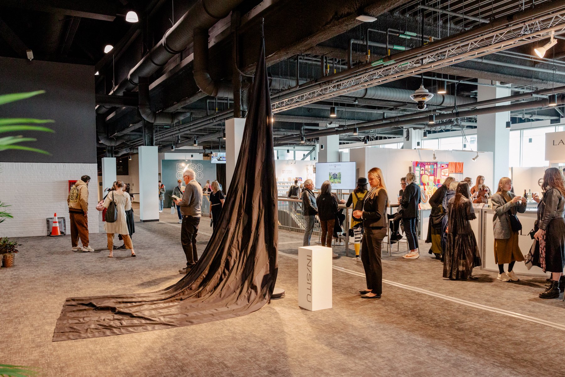 an image of fairgoers looking at art on Navy Pier in Chicago