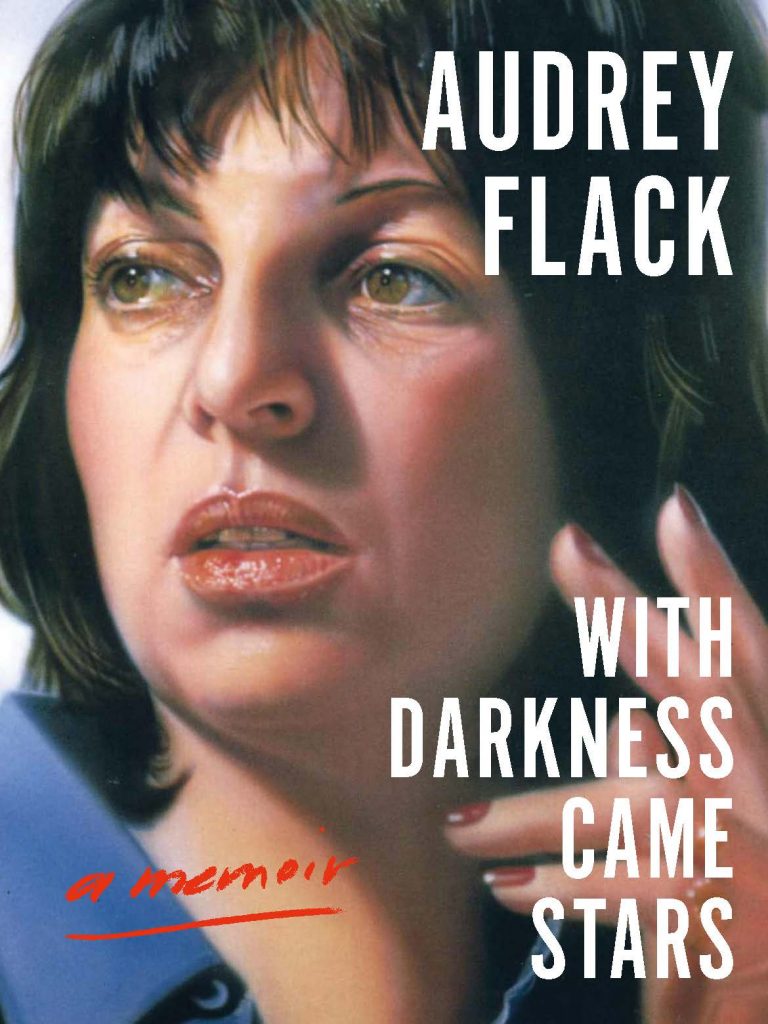 A painted self portrait of a young Audrey Flack on the cover of her memoir, with the author name and title overlaid in white.