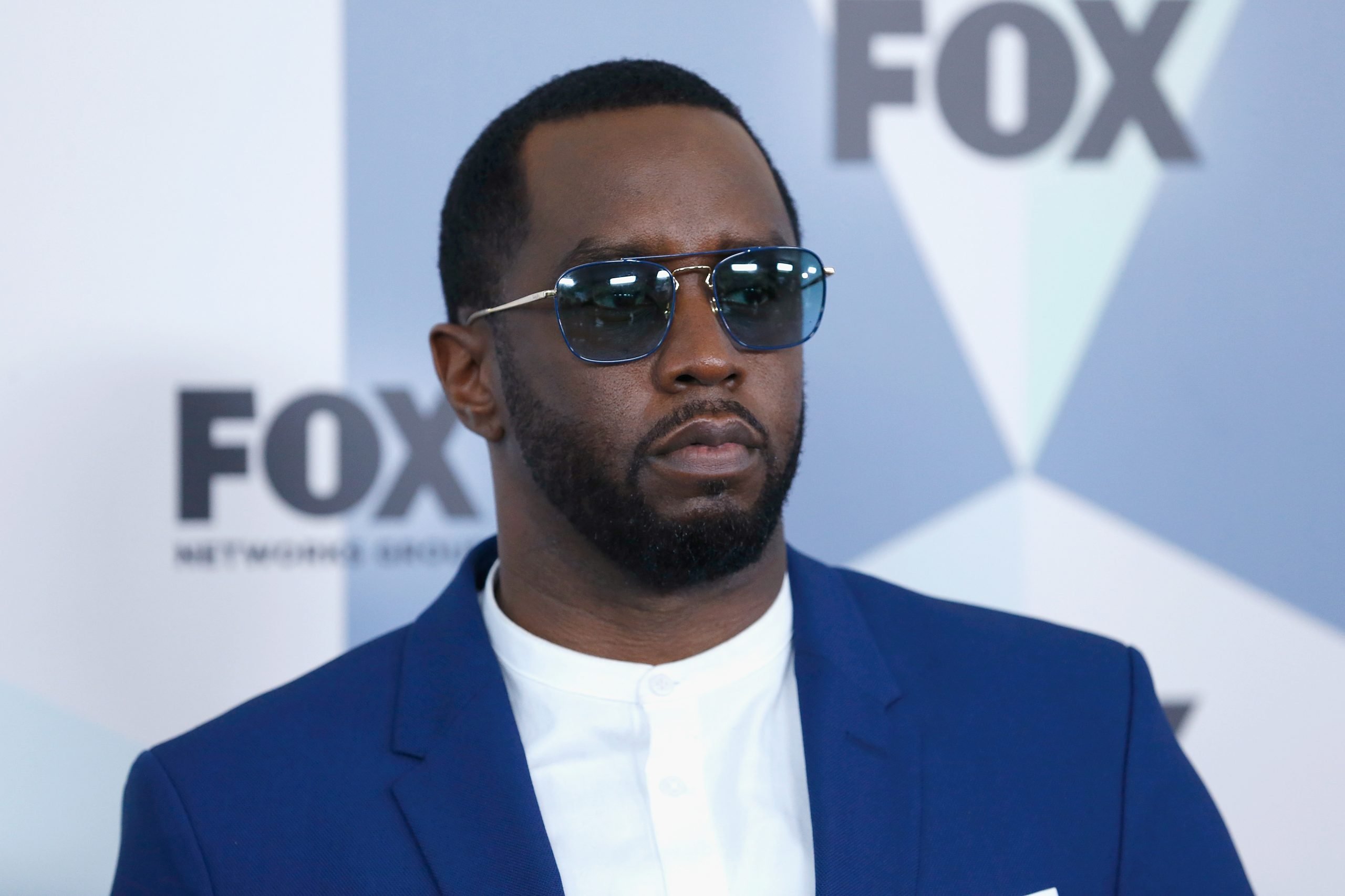 Sean Diddy Combs poses on the red carpet.