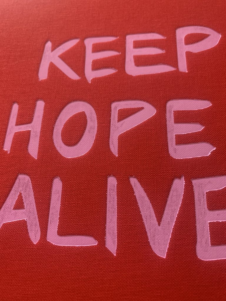 A red image with pink letters reads: KEEP HOPE ALIVE