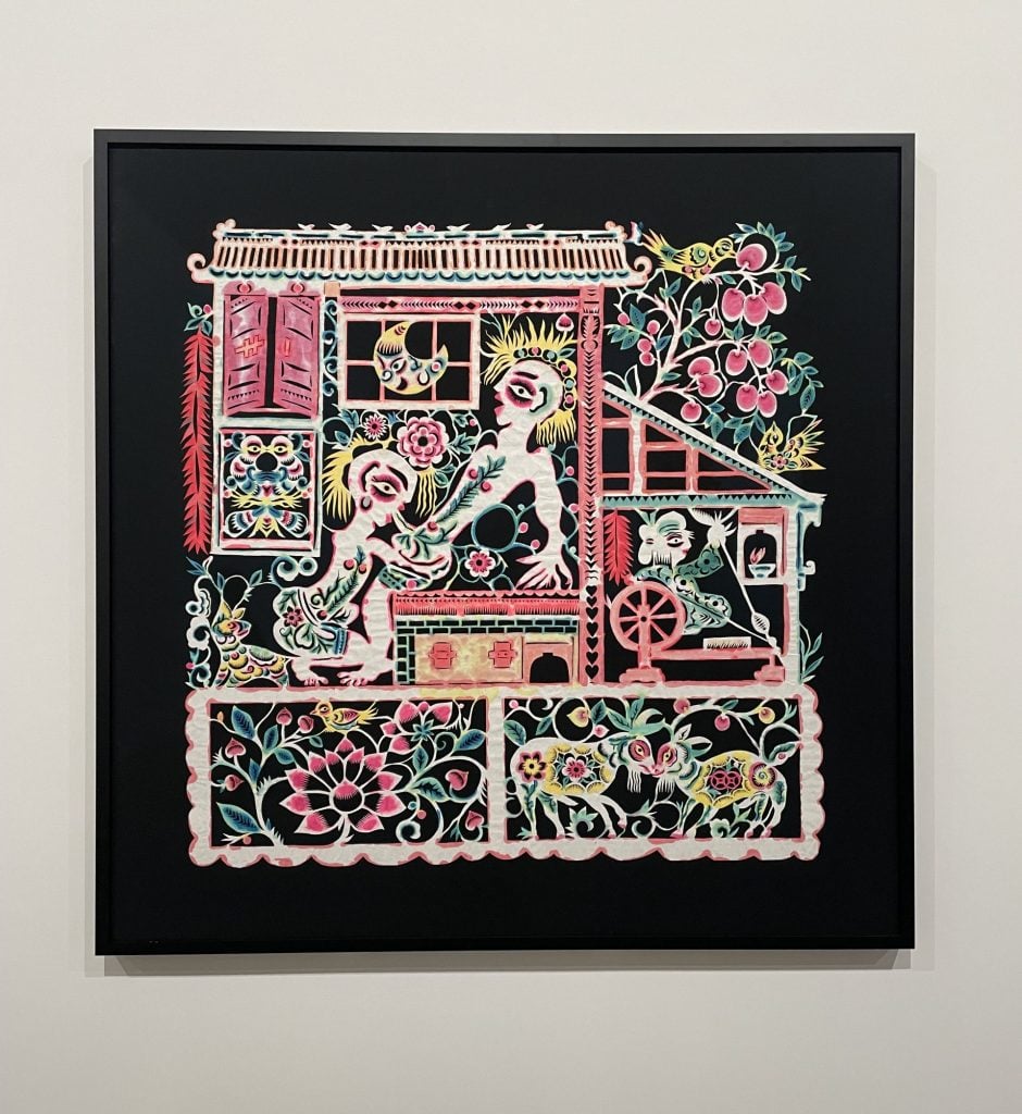 A colourful papercut artwork depicting a graphic homosexual scene