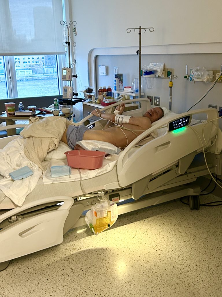 A man is seen in a hospital room