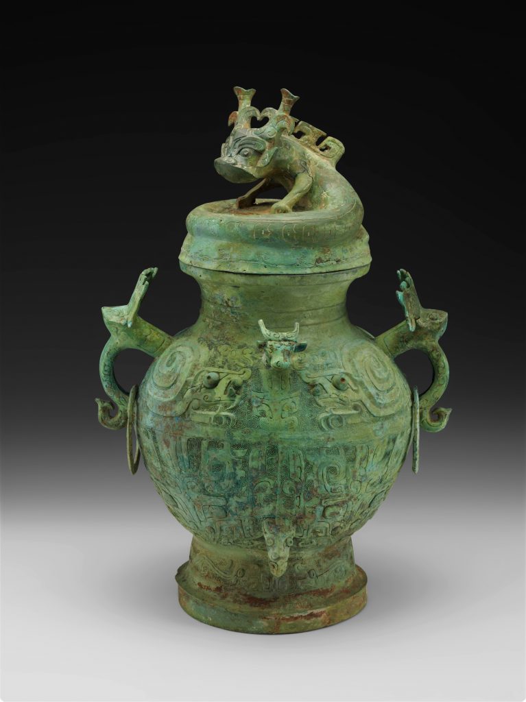 wine vessel from ancient china with a dragon motif