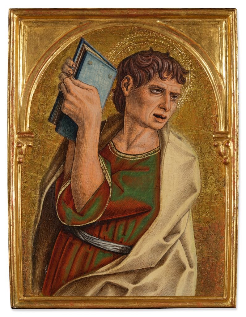 an image of a painting by Old Master Carlo Crivelli showing an apostle holding up a book and pictured against a gold leaf background