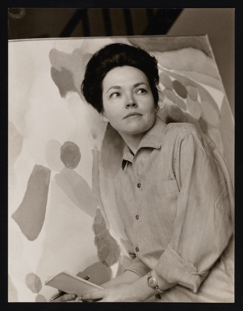 portrait of alice baber in front of her painting