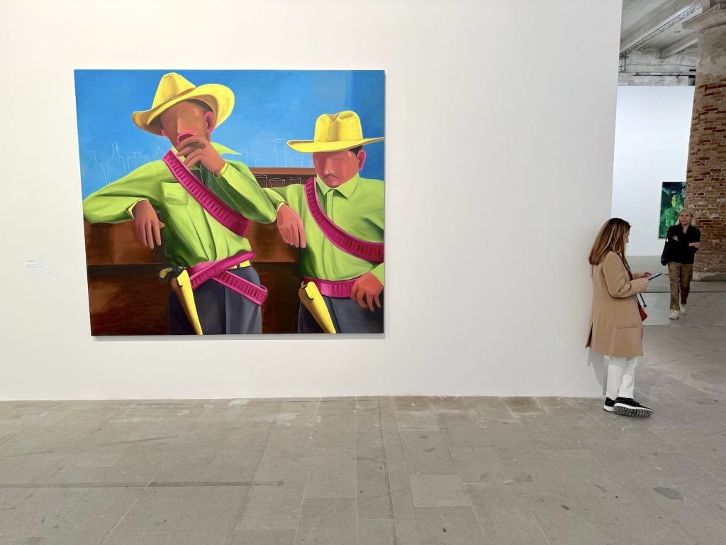 A painting of two men in cowboy hats with abstracted faces
