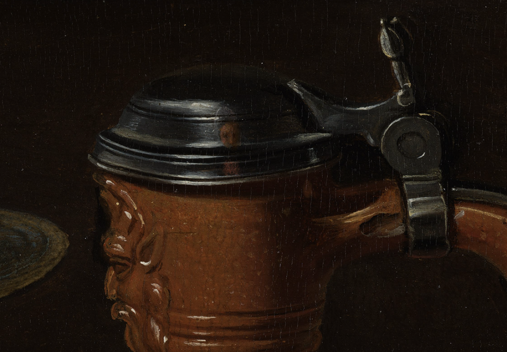 A detail of a painting shows the artist reflected in the metal lid of a jug.