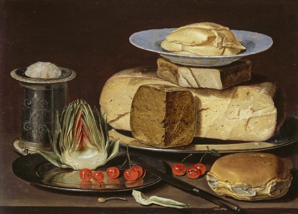 Cheeses and other foodstuffs on a table