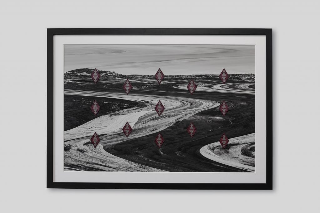 A black and white photo of curving roadways with diamond shapes superimposed over top at regular intervals, to be shown at the Photography Show.