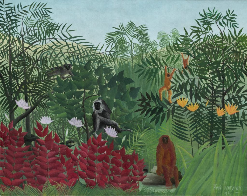 Henri Rousseau's painting of a jungle filled with large, colorful tropical plants, and five monkey swinging on their branches
