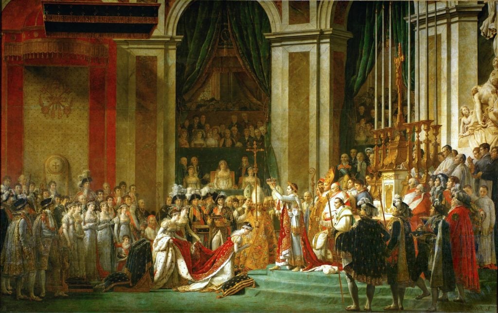 The Emperor Napoleon places a crown on his empress's head in a ceremony