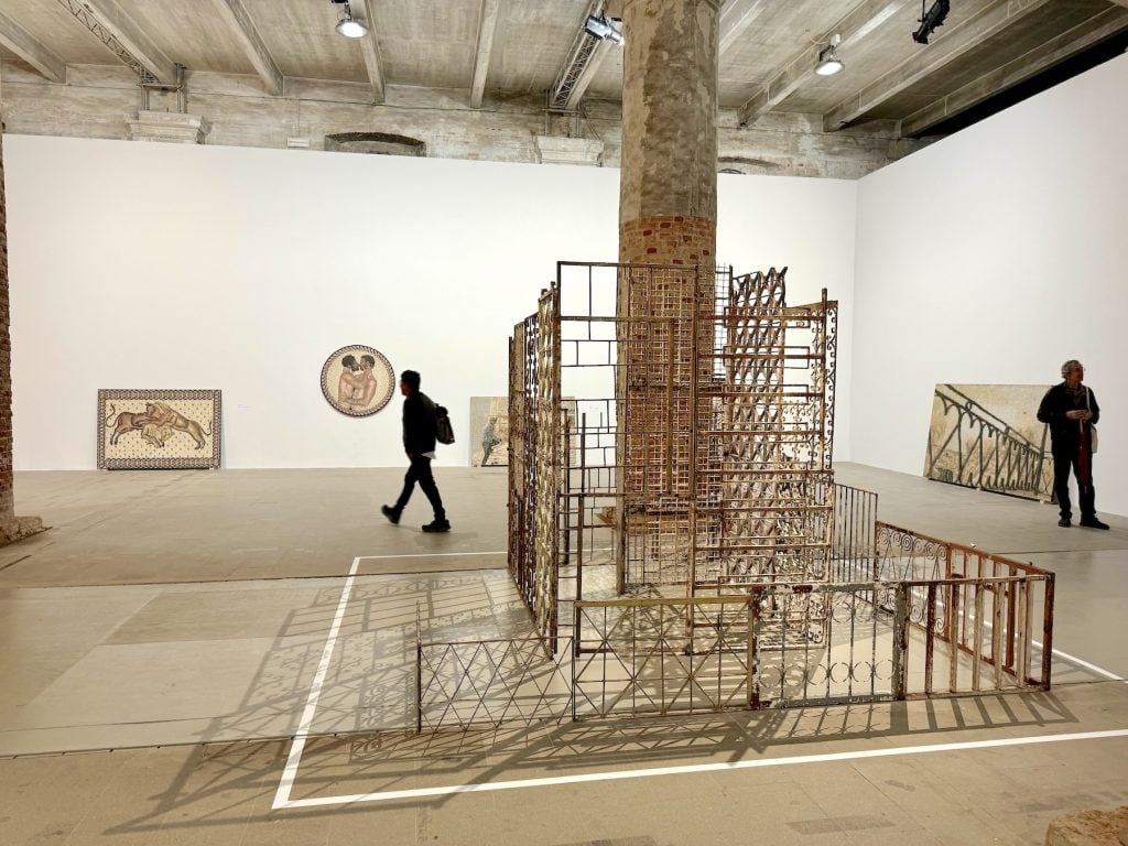 An iron sculpture made of the bars of a window cage