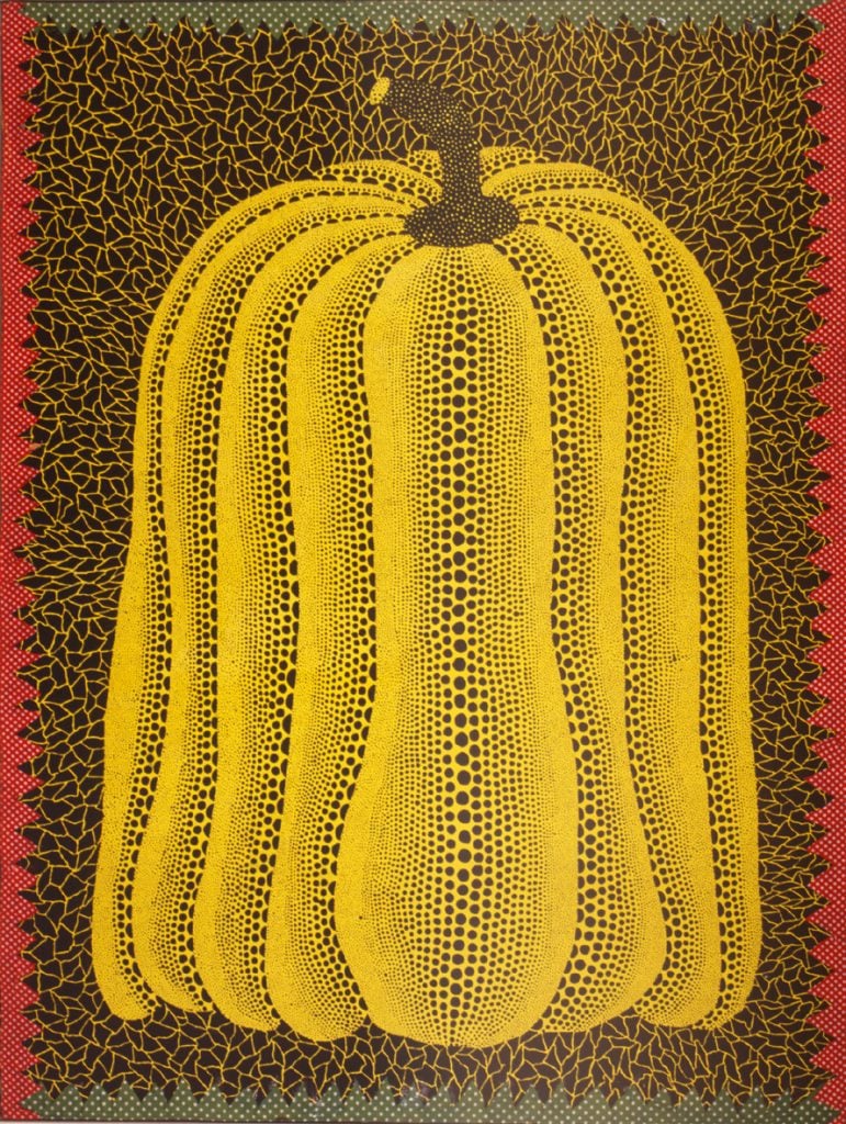 An image of a bright yellow pumpkin with an exaggerated shape on a densely patterned brown background with red borders on its left and right sides