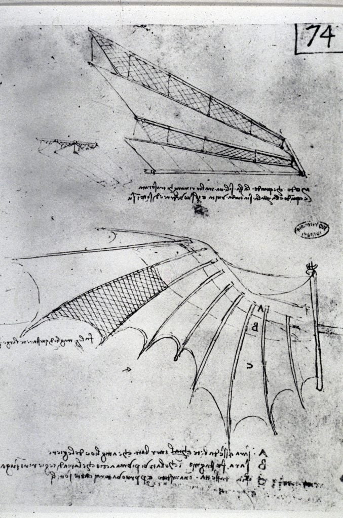 An ancient notebook page with design sketches for a flying machine