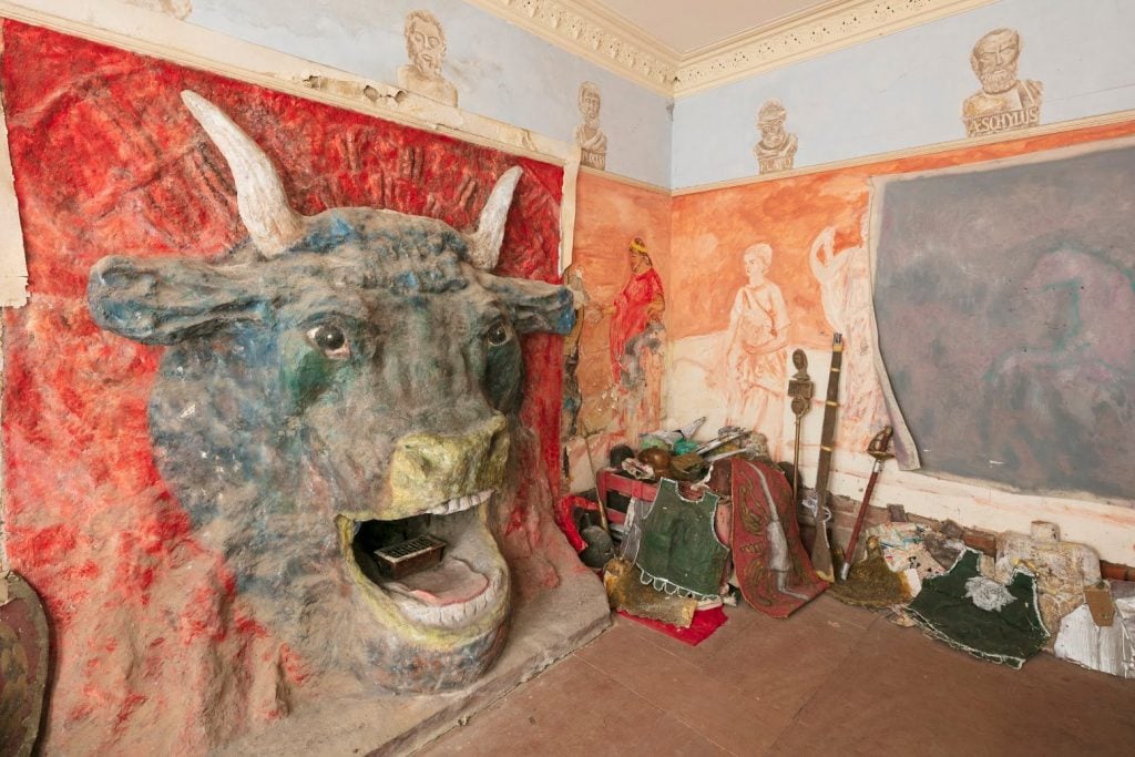 a fireplace in the shape of a minotaur