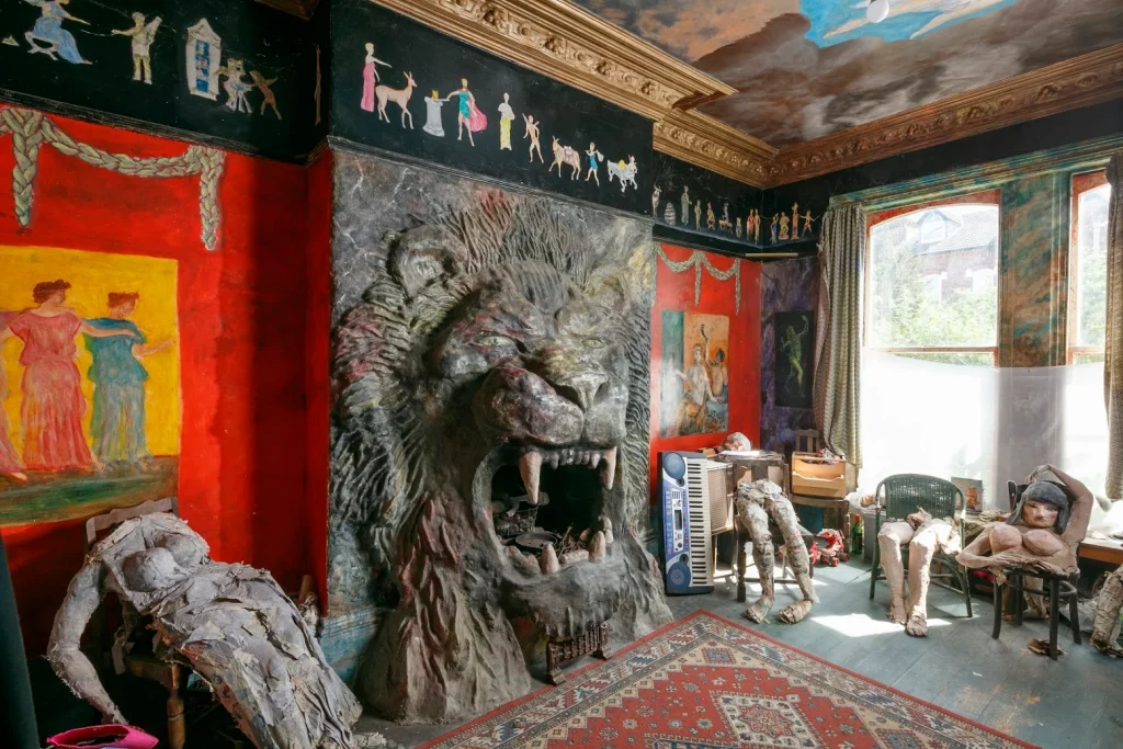 a fireplace in the shape of a lion's head